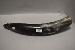 A vintage horn blowing horn.