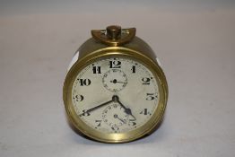 A zenith watch Co brass alarm clock.