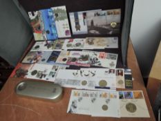 A collection of Coin and Medallion Covers, 25 in total, along with a 2000 Time Capsule with Coin