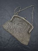 A silver mesh evening bag with clip clasp and carry chain, London 1919, Heasman & Co, bearing import