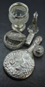 An Edwardian silver-mounted cut-glass vase, with flared and crimped rim over the globular cut-