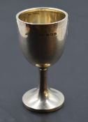 A 1930's silver communion cup, of plain form with spreading circular foot, marks for Birmingham