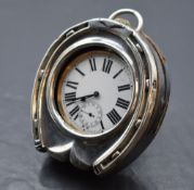 An Edwardian silver mounted horseshoe form pocket watch holder, marks for Birmingham 1906, maker