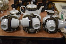 A 20th century part tea service by Noritake in porcelain with cobalt and gilt decoration