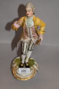 A 20th century porcelain figure of a Georgian man bearing a similar Meissen mark to base