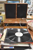 A mid century Stereosound system 404 with speakers and a selection vinyl
