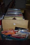 A selection of vinyl singles and albums including country chamber music and rock interest