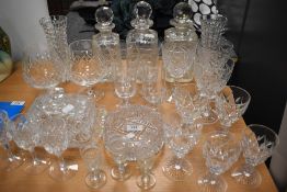 A selection of clear cut crystal glass wares including brandy, wine and cordial