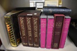 A selection of library volumes by Folia society including Domesday book and Le Morte Darthvr