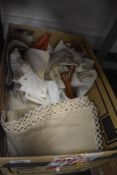 A selection of lace work and similar table place mats and napkins