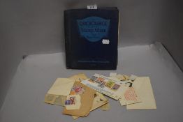 A vintage collectable stamp album with world and UK stamps