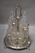 A late Victorian silver plated sauce, cruet or condiment set having revolving centre