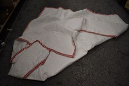 A modern bed throw quilt having chequer boarder