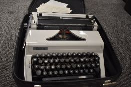 A mid century typewriter in fitted case by Erika