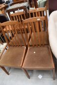 A set of four mid century dining chars in a Nathan design