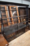 A 19th Century oak dresser back with drawer and plate rack to base, some signs of historical worm to