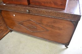 An early 20th Century oak ply bedding box, width approx. 115cm on castors