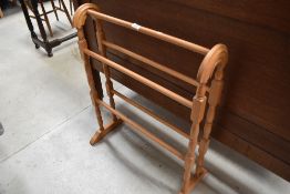 A traditional beech towel rail