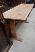 A natural pine kitchen table in the Shaker style