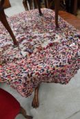 Two colourful wool rugs.