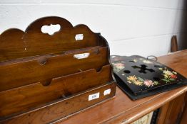 A Victorian stationery rackand a laquered wall pocket