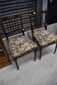 A pair of Victorian ebonised bedroom chairs