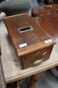 A 1950's stained mahogany cash till, of traditional design.