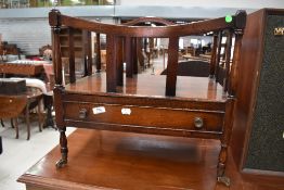 A reproduction Regency canterbury style magazine rack