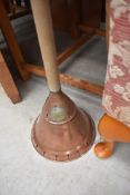 A vintage copper headed posser, with applied brass label 'Eclipse Leeds'