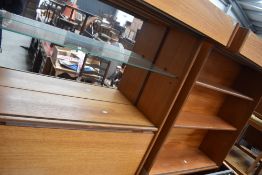 A pair of mid Century teak wall units