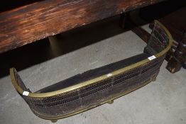A Victorian brassv and mesh fire fender
