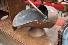 A copper coal helmet.