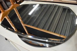 Two vintage frameless wall mirrors