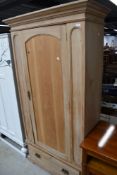 A Victorian stripped pine wardrobe