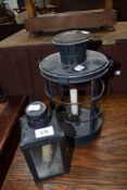 Two candle lanterns