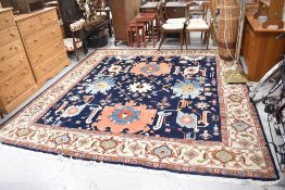 A room size handmade Persian rug from Heriz, north east Iran. Work of Farid in
