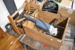 A selection of hand tools and electric Bosch grinder