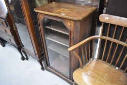 A 19th Century walnut music sheet music cabinet having glass front