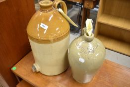 Two stoneware flagons, including Atkinson of Penrith