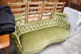 A Victorian chaise longue having later green dralon upholstery