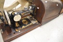 A traditional cased sewing machine