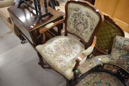A reproduction French style easy chair
