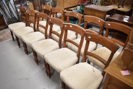 A set of eleven elm reproduction rail back dining chairs, circa 1860
