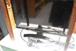 An LG flat screen 24' TV