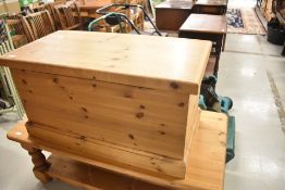 A natural pine bedding box