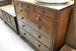 A 19th Century mahogany chest of three small over two short over three long drawers, with turned