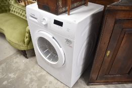 A Bosch 7kg washing machine , some use but still looks in decent order