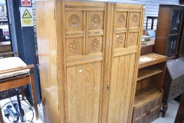 A Victorian satinwood wardrobe, in the Aesthetic style