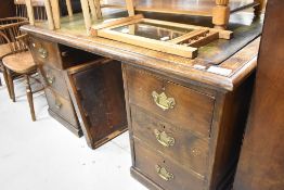 A late 19th or early 20th Century oak partners desk, approx. 150 x 105cm
