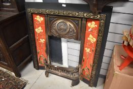 A reproduction tiled fire surround